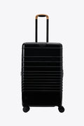 Resale The Medium Check-In Roller in Glossy Black