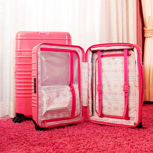The Carry-On Roller in Barbieƒ?› Pink